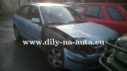 Mazda 323f světle modrá - díly z tohoto vozu / dily-na-auta.eu